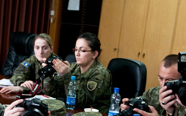 MNBG-E public affairs soldiers educate multinational counterparts in photography