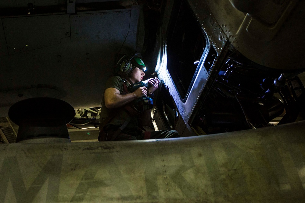 22nd MEU Marines work in Bataan hangar bay