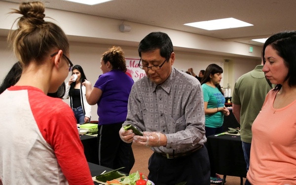 Spouses make sushi, build camaraderie