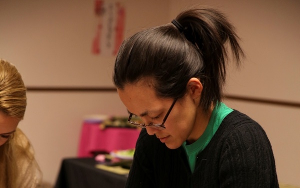 Spouses make sushi, build camaraderie