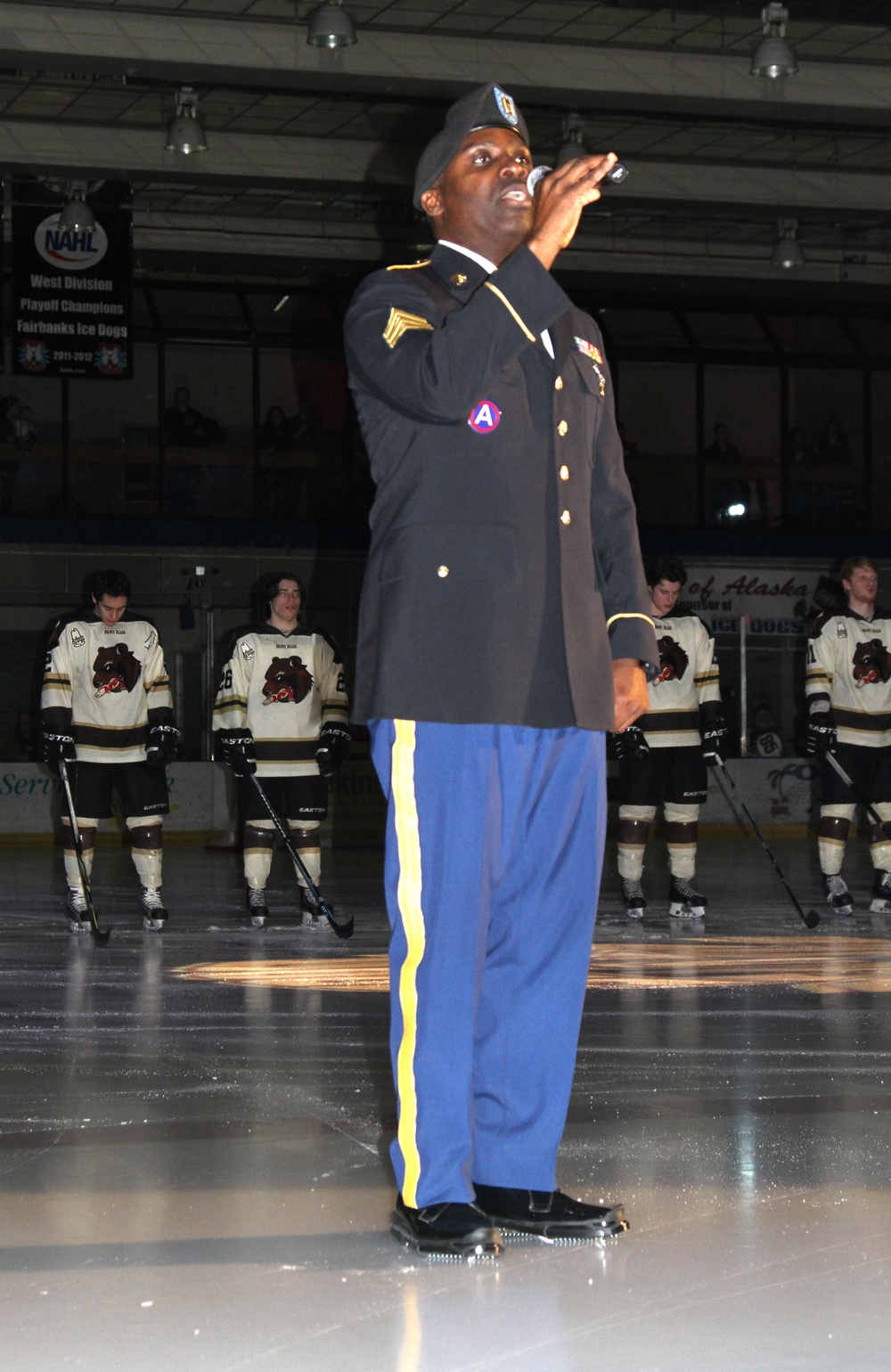 Soldier sings anthem during military appreciation night