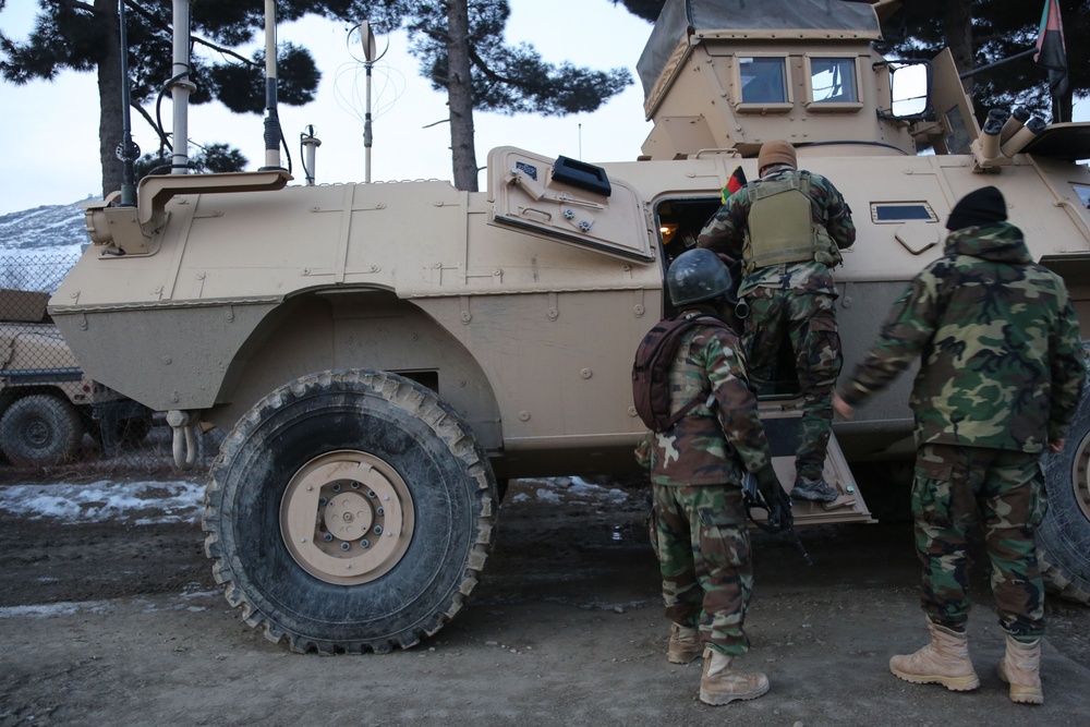 Afghan National Army commandos prepare to conduct an operation