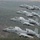 Four A-10 Thunderbolt II (Warthog) aircraft fly in a staggered formation over a forested landscape. The aircraft bear markings consistent with the Arkansas Air National Guard, specifically the 188th Fighter Wing based at Fort Smith, Arkansas. The formation is captured from a slightly elevated angle, likely from a fifth aircraft or aerial platform.