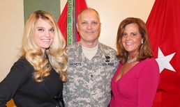 Brig. Gen. Bruce Hackett and family celebrate his promotion