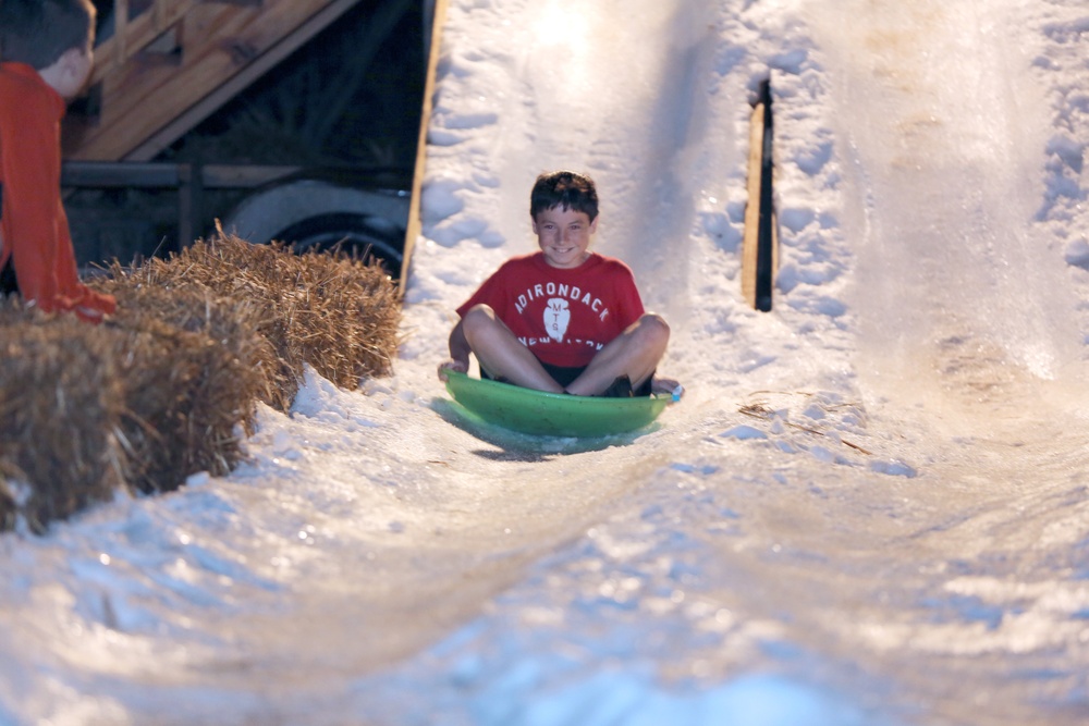 Two tons of snow covers Swansboro for Snow Up The Park