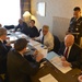 Secretary of Defense Chuck Hagel meets with staff