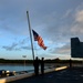 USS Mesa Verde sailors raise the American flag