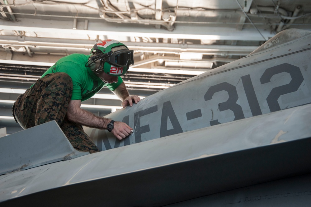 F/A-18C Hornet maintenance aboard USS Harry S. Truman