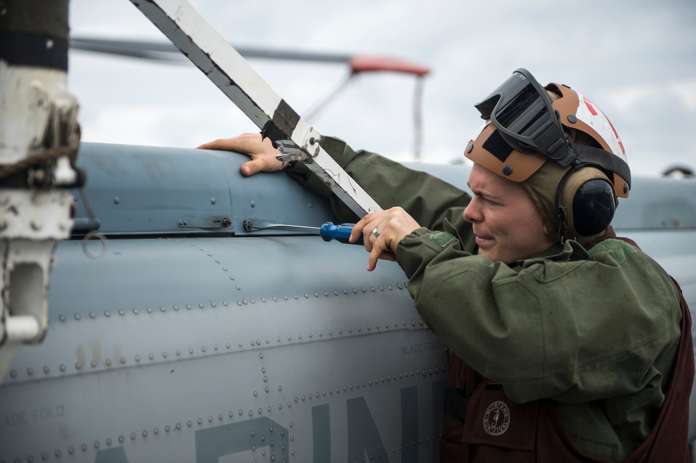 VMM-265 helicopter maintenance aboard USS Denver