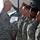 Odierno presents coins to soldiers