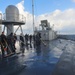 Sailors swab USS Blue Ridge's main deck