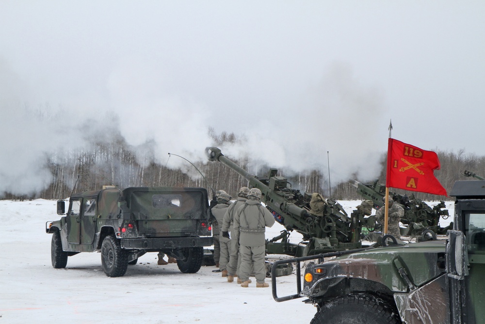 Michigan National Guard conducts cold weather sling load and howitzer live fire exercise