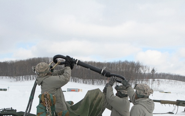 Michigan National Guard conducts cold weather sling load and howitzer live fire exercise
