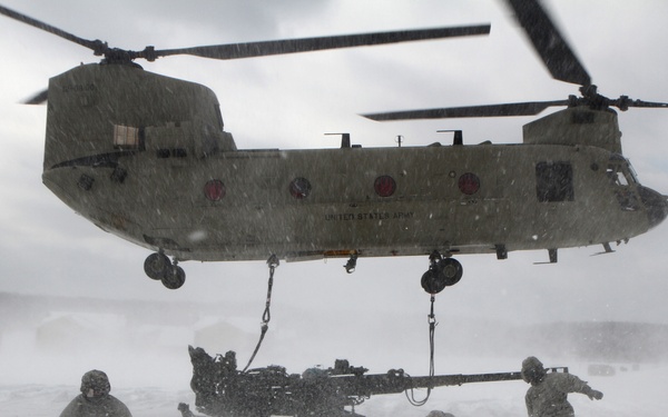 Michigan National Guard conducts cold weather sling load and howitzer live fire exercise