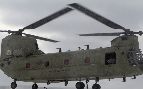 Michigan National Guard conducts cold weather sling load and howitzer live fire exercise