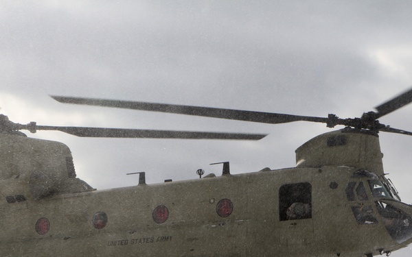 Michigan National Guard conducts cold weather sling load and howitzer live fire exercise