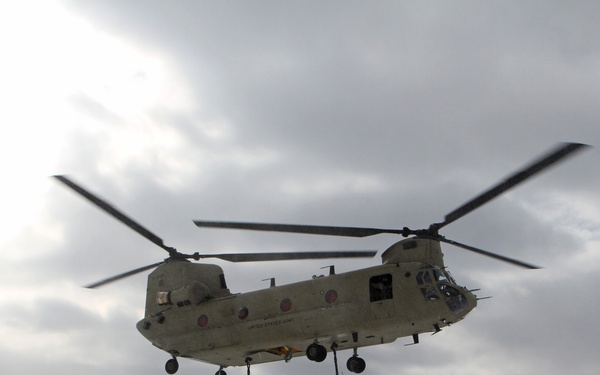 Michigan National Guard conducts cold weather sling load and howitzer live fire exercise