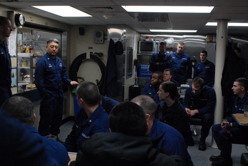 Hollyhock's commanding officer briefs the crew