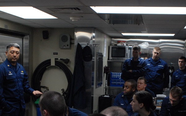 Hollyhock's commanding officer briefs the crew