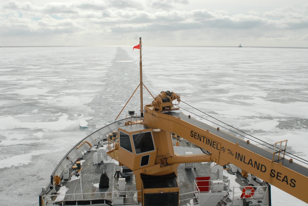 Coast Guard Cutter Hollyhock maintains a track through the ice