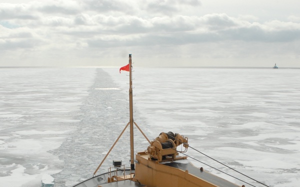 Coast Guard Cutter Hollyhock maintains a track through the ice