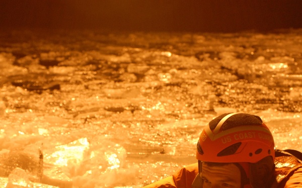 Hollyhock crew member in ice during ice rescue training