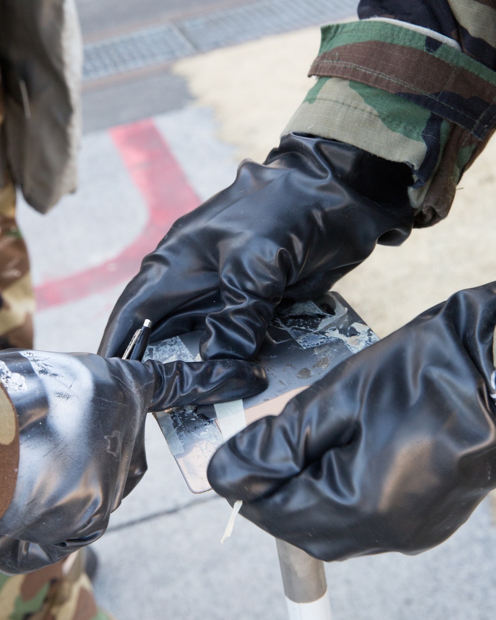 374th MXS tests operational capability during chemical attack