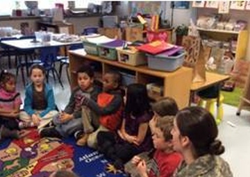 The 44th Expeditionary Signal Battalion’s Woman in the Military Mentorship Volunteer with Grafenwoehr Elementary School