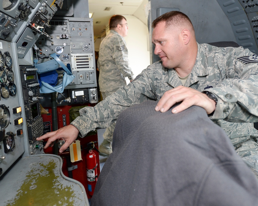 E-8C Joint STARS crew chief in action