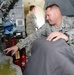 E-8C Joint STARS crew chief in action