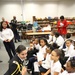 Soldier explains her uniform to students
