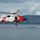 Coast Guard MH-60 Jayhawk helicopter crew completes vertical surface training hoist operation in Kodiak, Alaska
