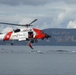 Coast Guard MH-60 Jayhawk helicopter crew completes vertical surface training hoist operation in Kodiak, Alaska