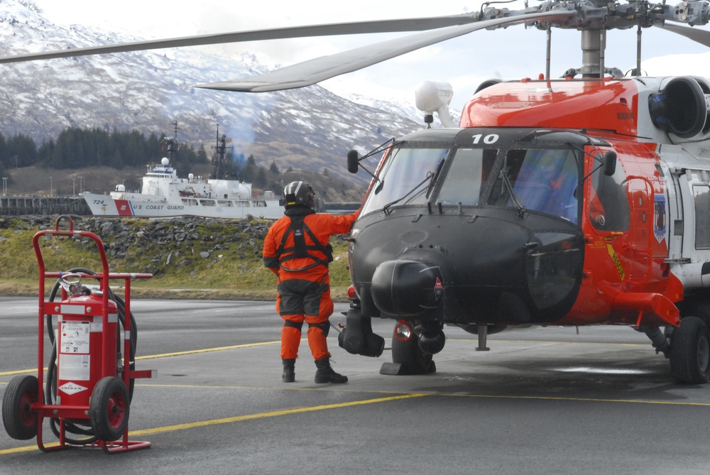 Coast Guard MH-60 Jayhawk helicopter crew prepares for test flight in Kodiak, Alaska