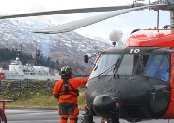 Coast Guard MH-60 Jayhawk helicopter crew prepares for test flight in Kodiak, Alaska