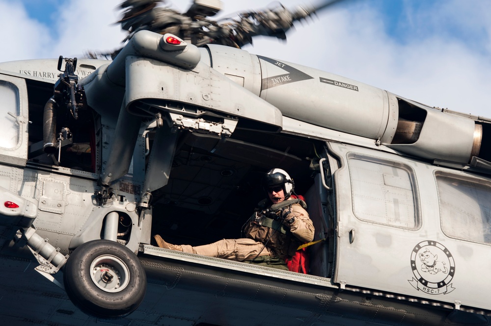 Directing an MH-60S Seahawk helicopter