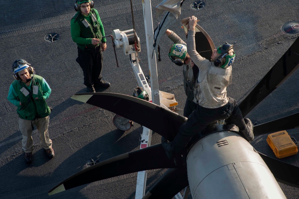 Sailors perform maintenance