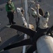 Sailors perform maintenance