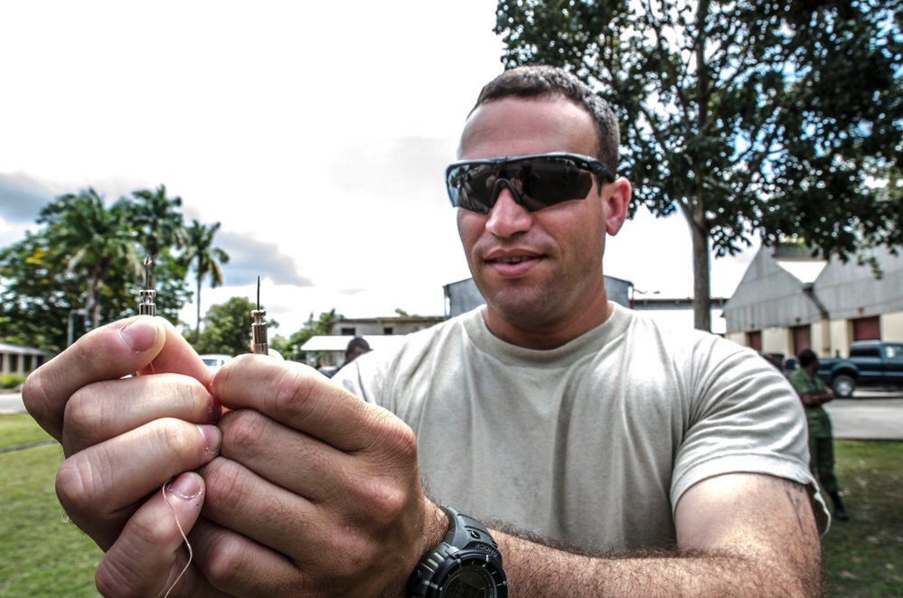 US and Belize military train on non-lethal weapons during Fused Response 2014