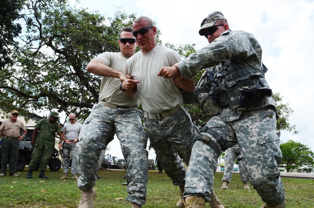 U.S. and Belize military train on non-lethal weapons during Fused Response 2014.