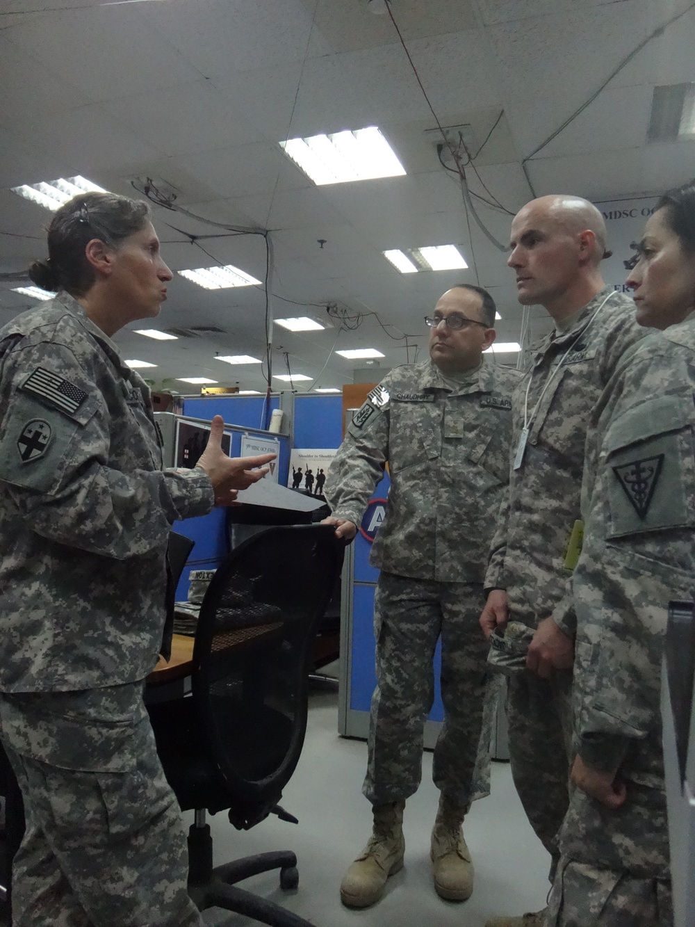 Chief of clinical operations explains daily operations to new incoming soldiers