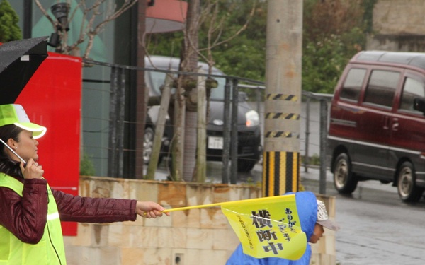 10th Regional Support Group soldiers cross over to help Japanese children