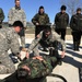 Army flight crew shows proper use of stretcher to multinational medics