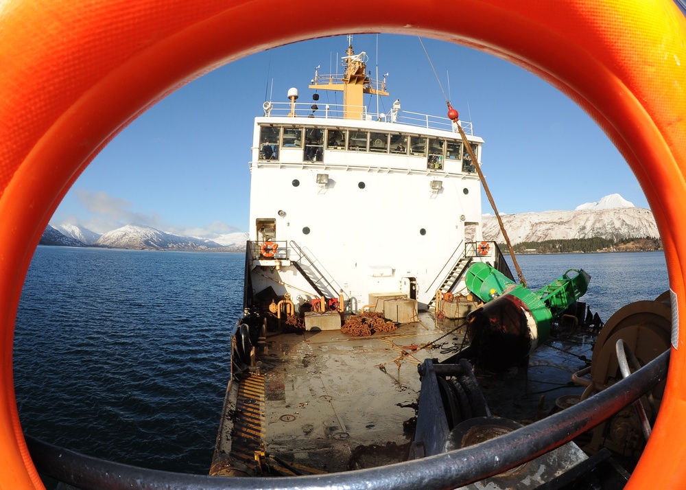Coast Guard Cutter SPAR maintains aids to navigation near Kodiak, Alaska