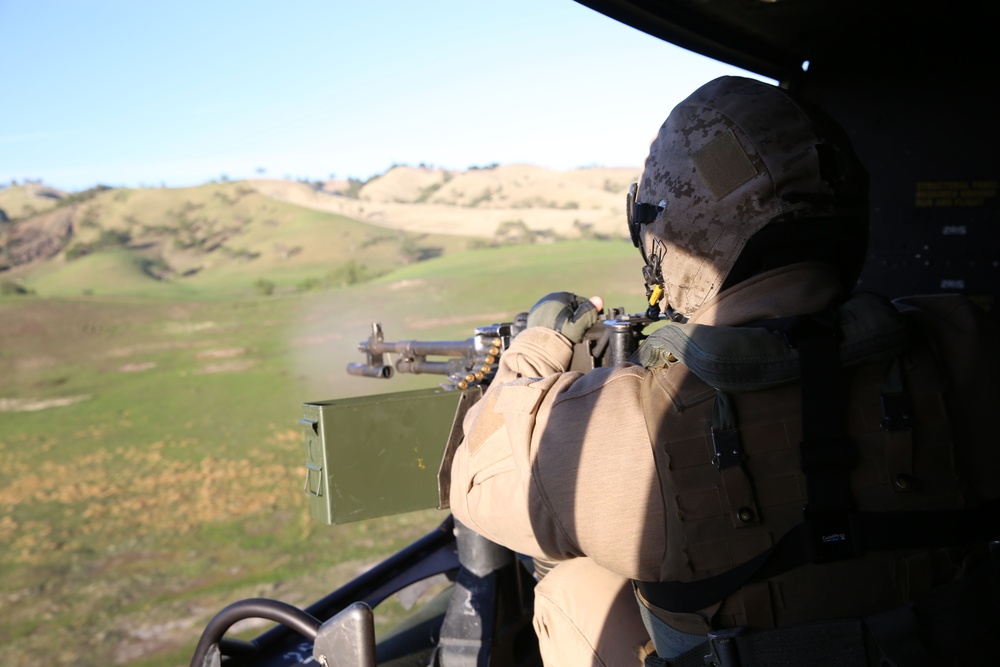 VMM-163 (Reinforced) Marines open fire from the sky