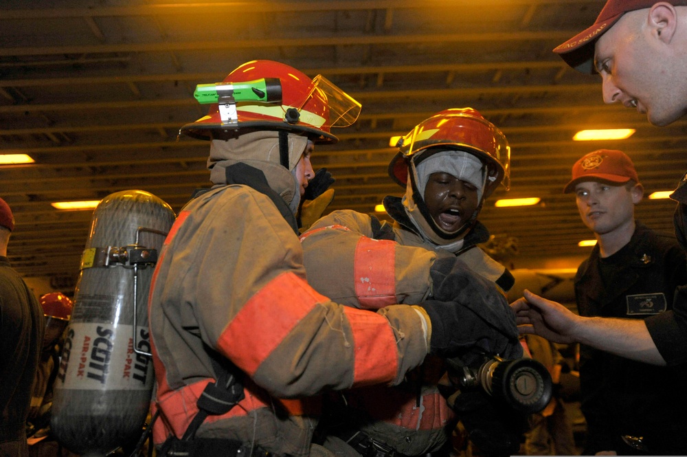 Repair locker training aboard USS Bataan