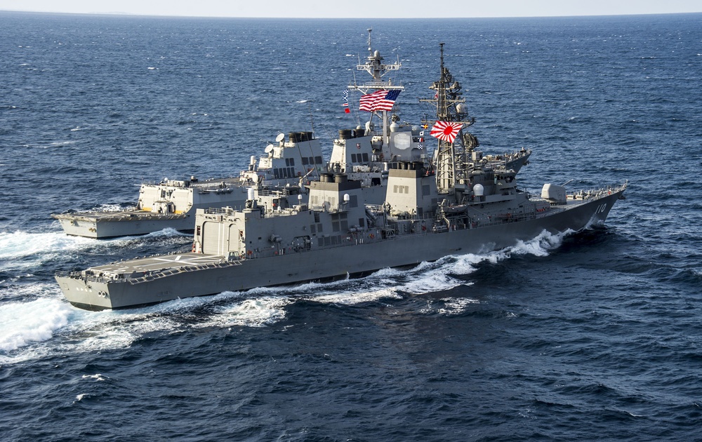 Japan Maritime Self-Defense Force destroyer Takanami sails with USS McCampbell