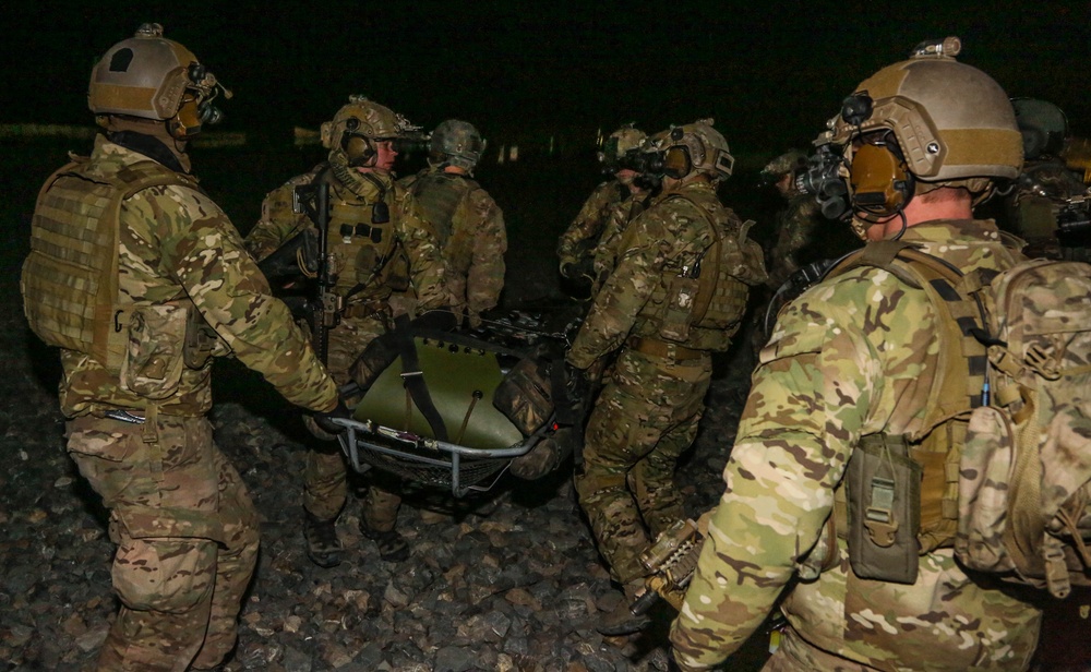 Coalition force members conduct training
