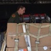 New Horizons Belize team off-loads cargo from C-17