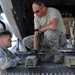 New Horizons Belize team off-loads cargo from C-17